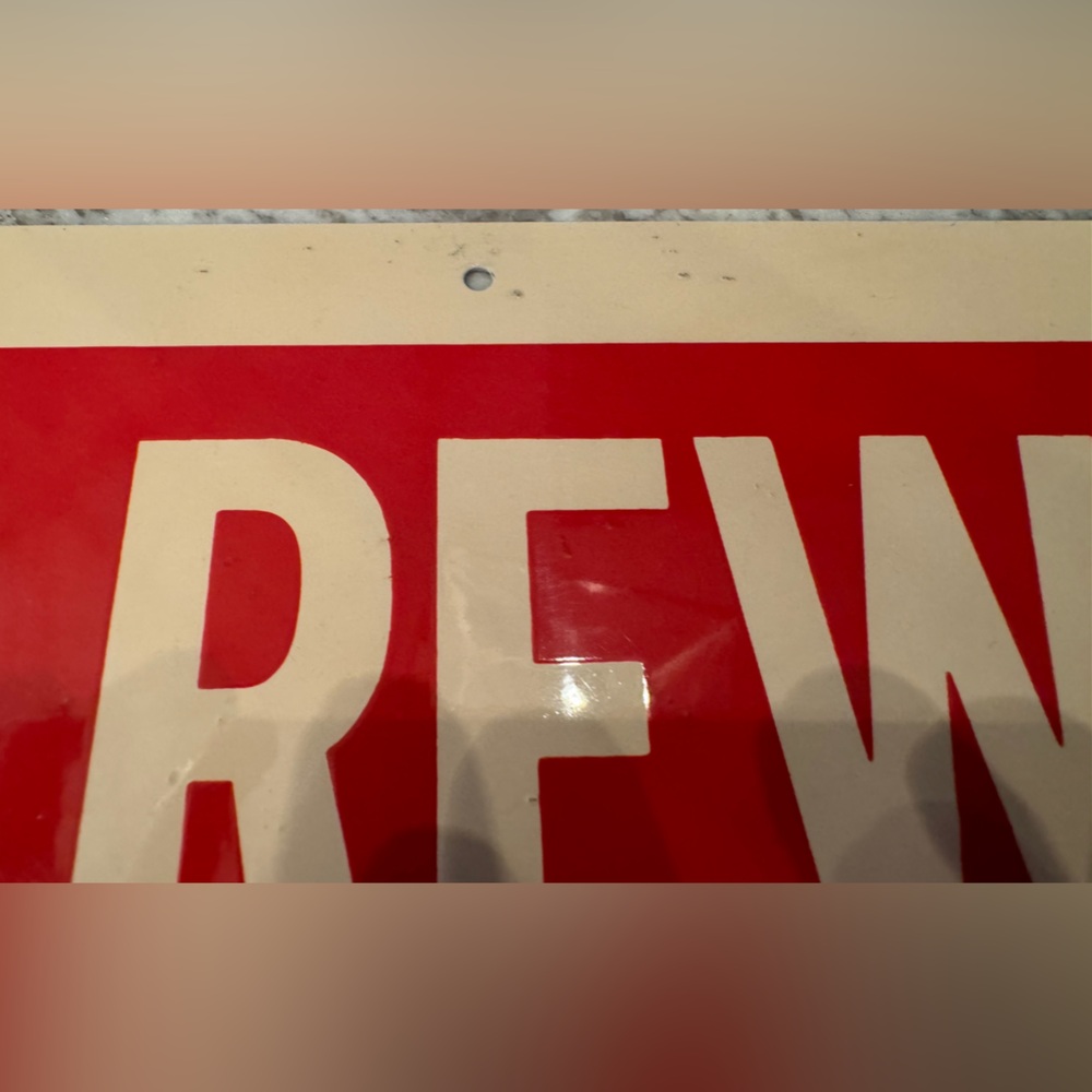 The sign in the image is a Farm Bureau reward sign. Scioto Sign Co. Kenton, Ohio - Picture 5 of 11